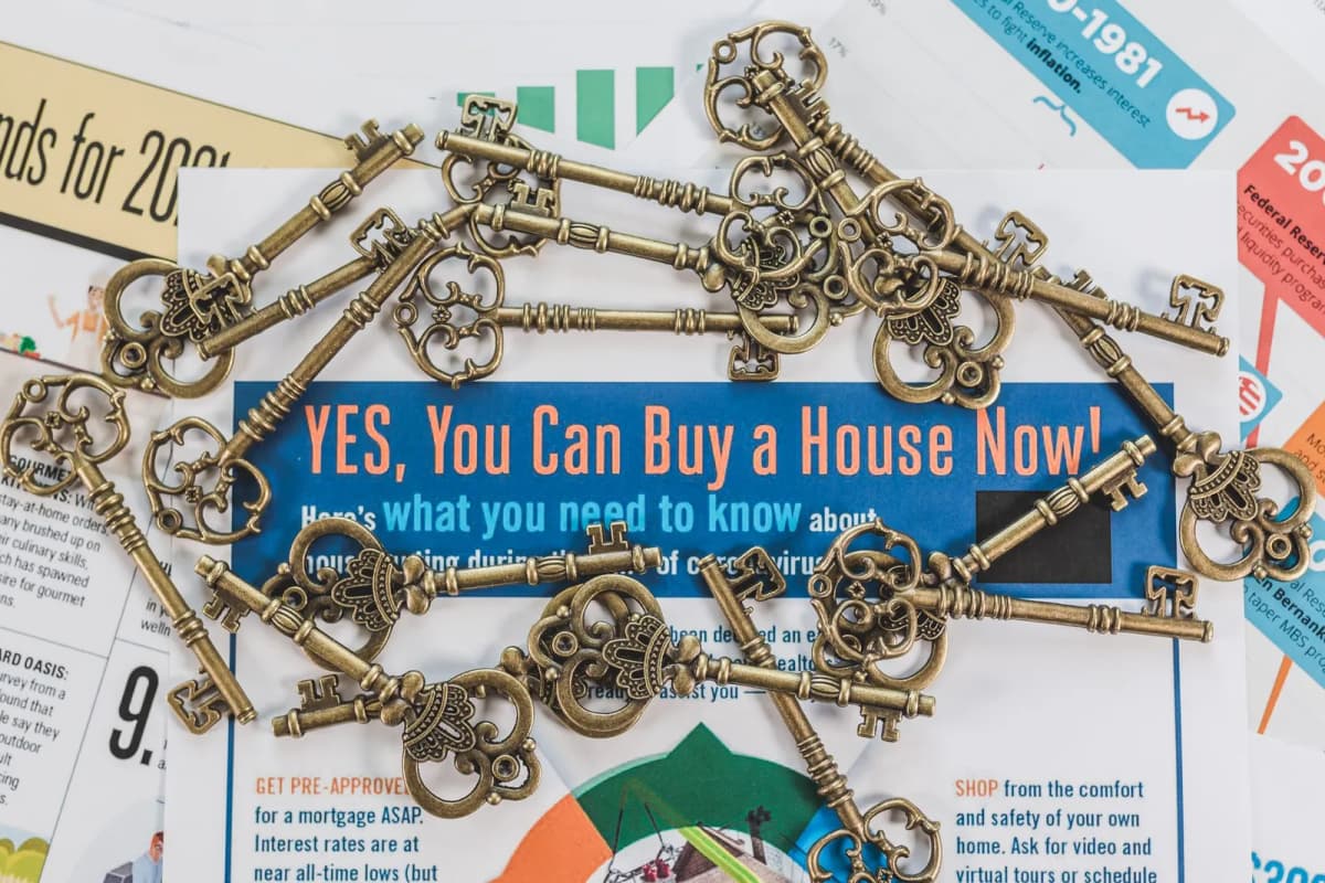 House keys resting on a set of property documents