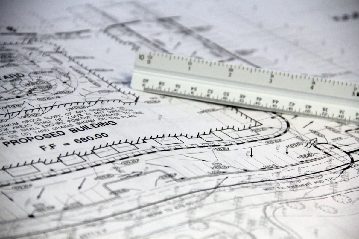 A site plan with a scale ruler marking where a proposed structure sits on the lot