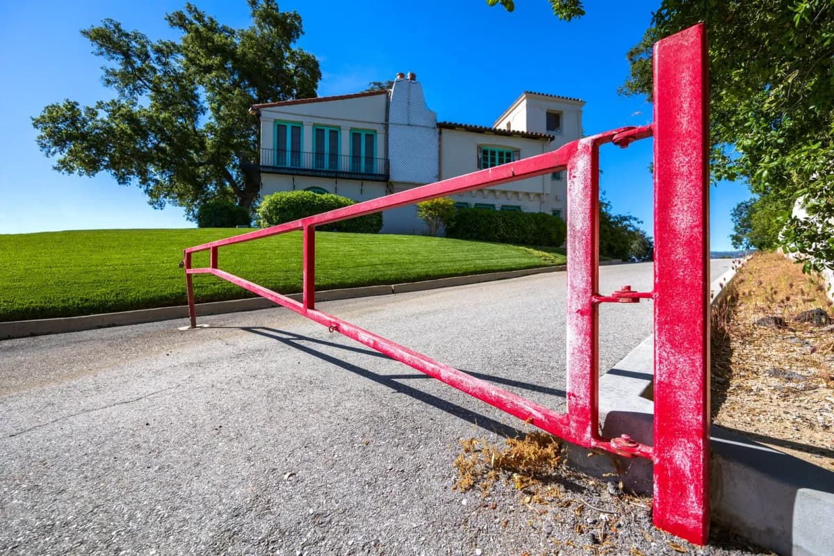A gate at the entrance to a residence