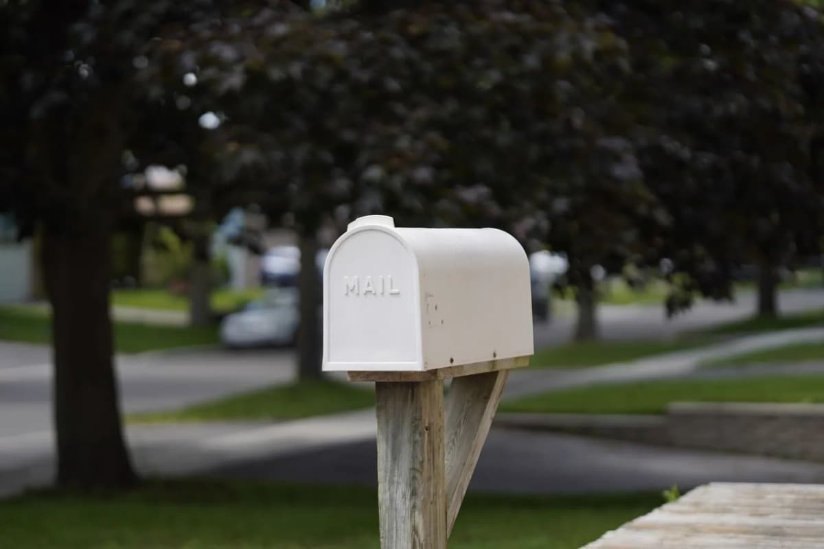 A curbside mailbox in a suburban neighborhood