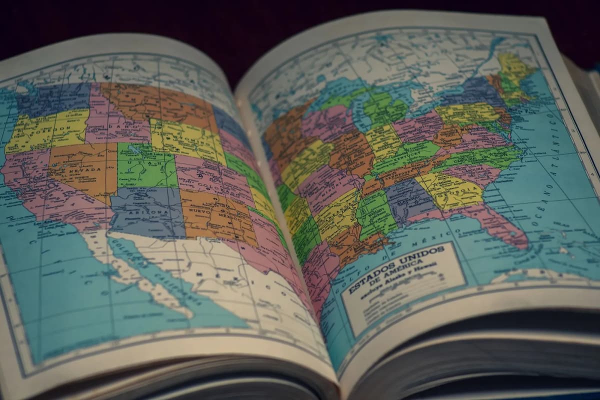 Open atlas showing a map of the United States