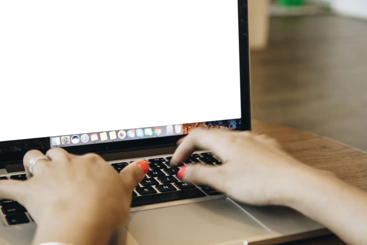 A board member at a home desk working through a document request