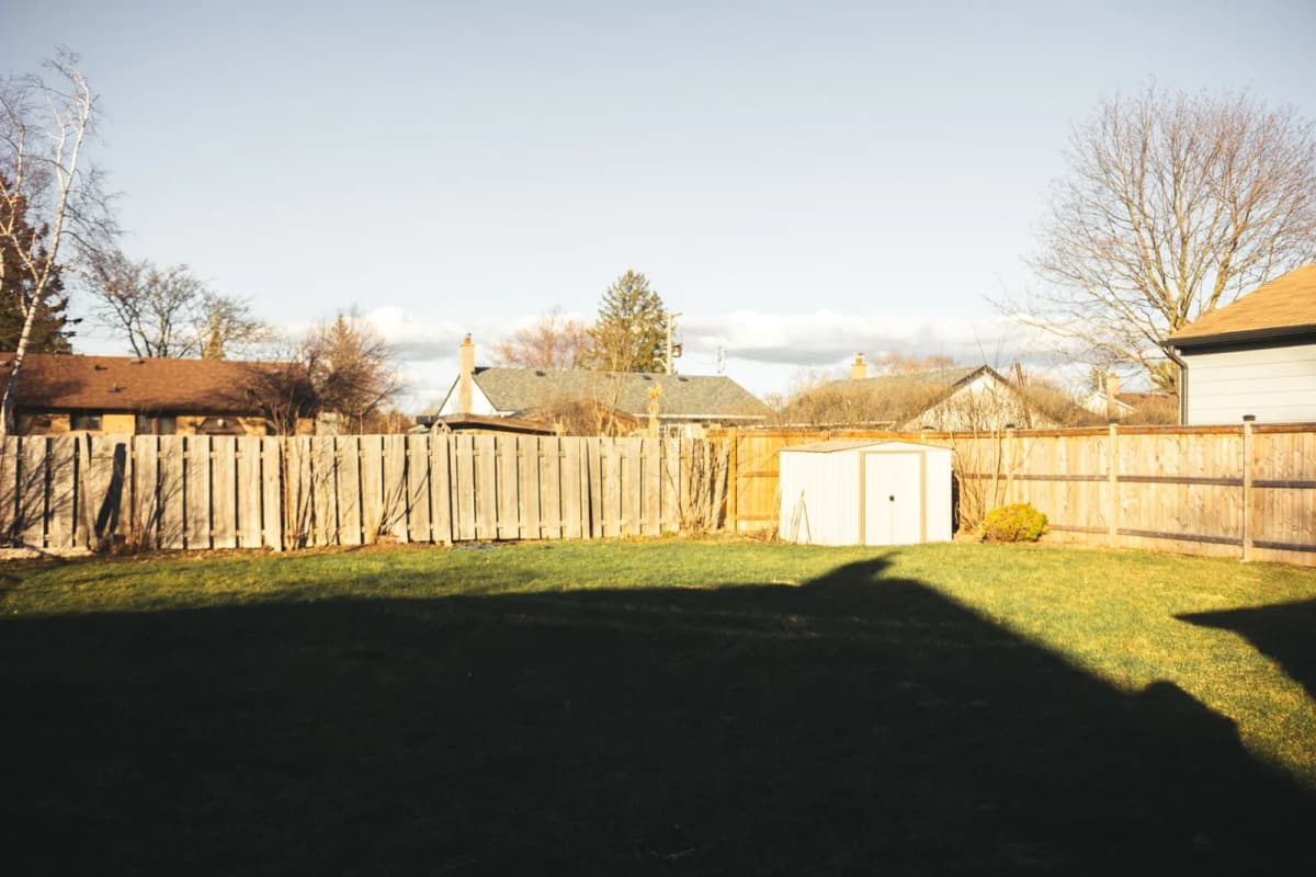 A backyard structure of the kind that becomes a dispute only when the neighbor's is ignored