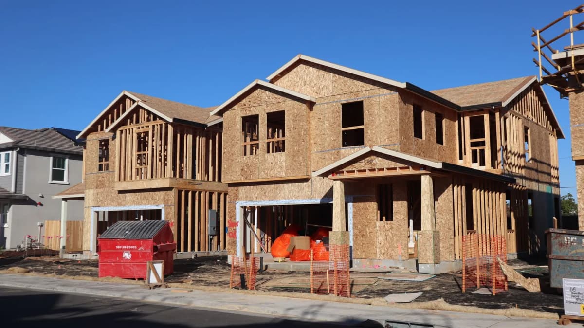 New houses under construction in a residential subdivision